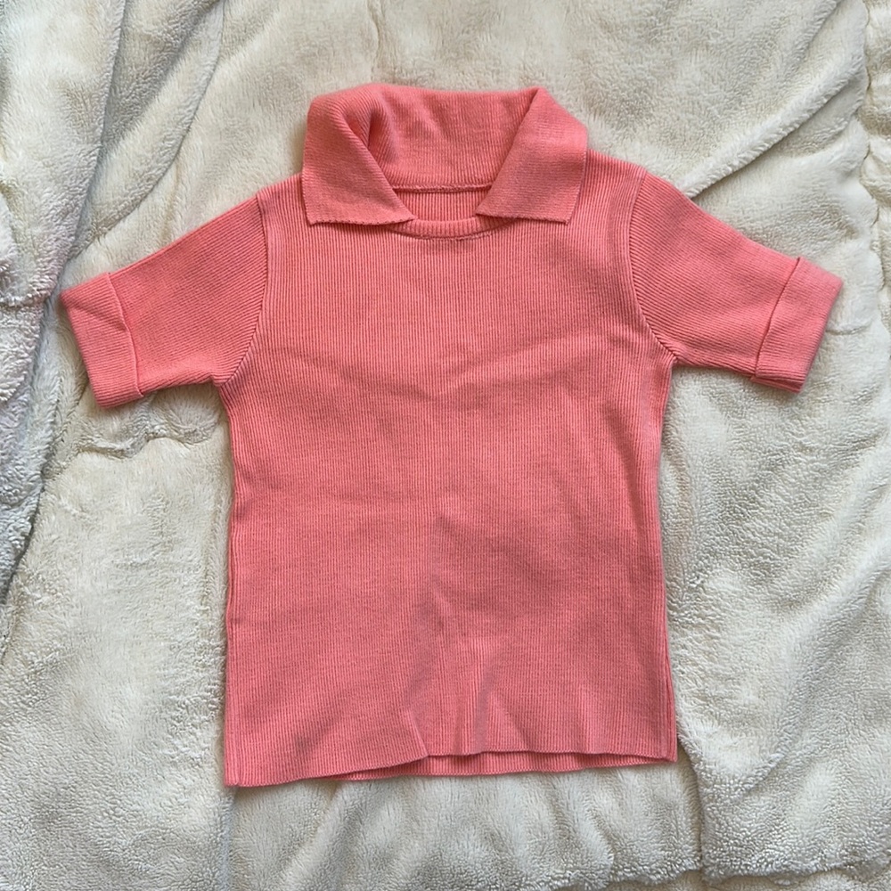 Orange top for kid 4 -5 years old  this top is from 70th